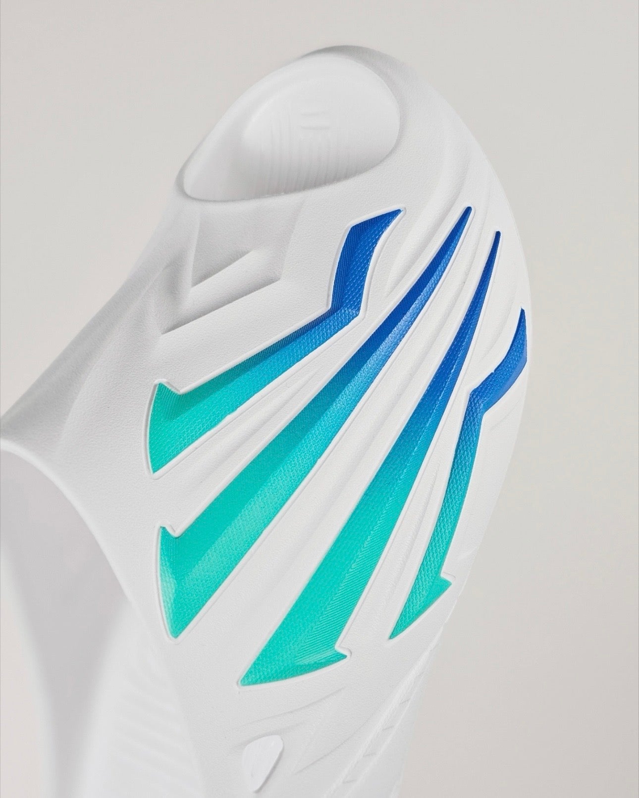 ANTA HELA SLIDE 2 White ティール ブルー グラデーション 稲妻グラフィック EVAアッパー 接写